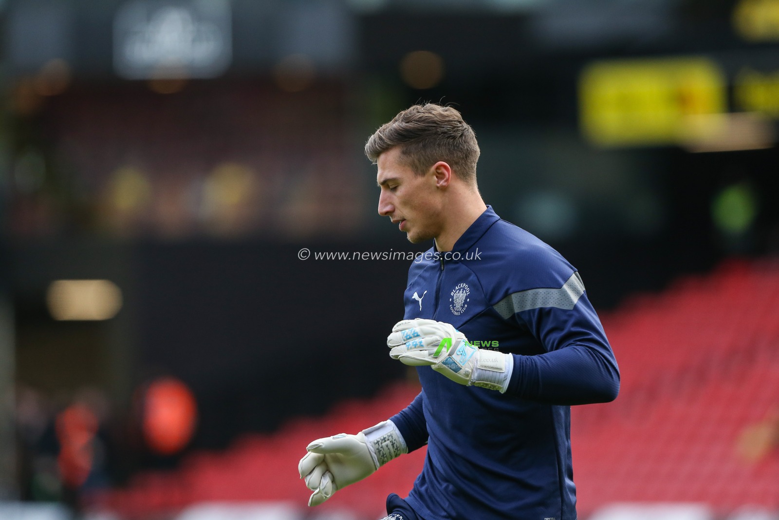 Stuart Moore #13 of Blackpool warms up during the Sky Bet Championship match Watford vs Blackpool at Vicarage Road, Watford, United Kingdom, 14th January 2023

(Photo by Arron Gent/News Images)