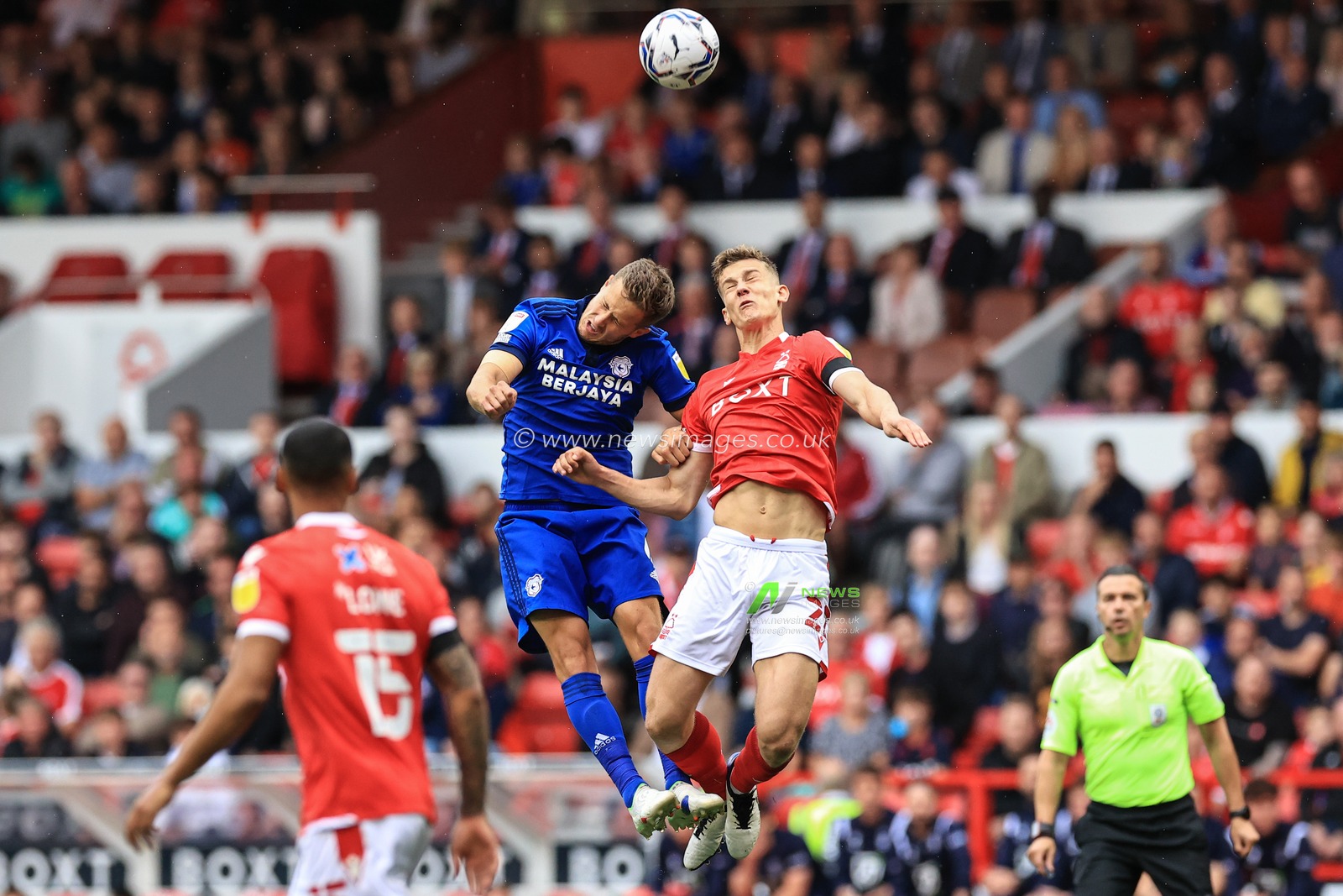 Will Vaulks #6 of Cardiff City and Ryan Yates #22 of Nottingham Forest battle for the ball
