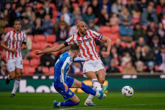 Steven Nzonzi of Stoke City passes the ball  under pressure from Charlie McNeill of Sheffield Wednesday during the Sky Bet Championship match Stoke City vs Sheffield Wednesday at Bet365 Stadium, Stoke On Trent, United Kingdom on 03 April 2026

(Photo by Maynard Manyowa/News Images)
