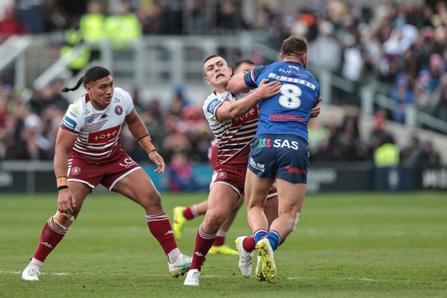 Mike McMeeken of Wakefield Trinity is tackled by Brad O'Neill of Wigan Warriors during the Betfred Challenge Cup Quarter Final match Wakefield Trinity vs Wigan Warriors at DIY Kitchens Stadium, Wakefield, United Kingdom on 12 April 2026

(Photo by Mark Cosgrove/News Images)