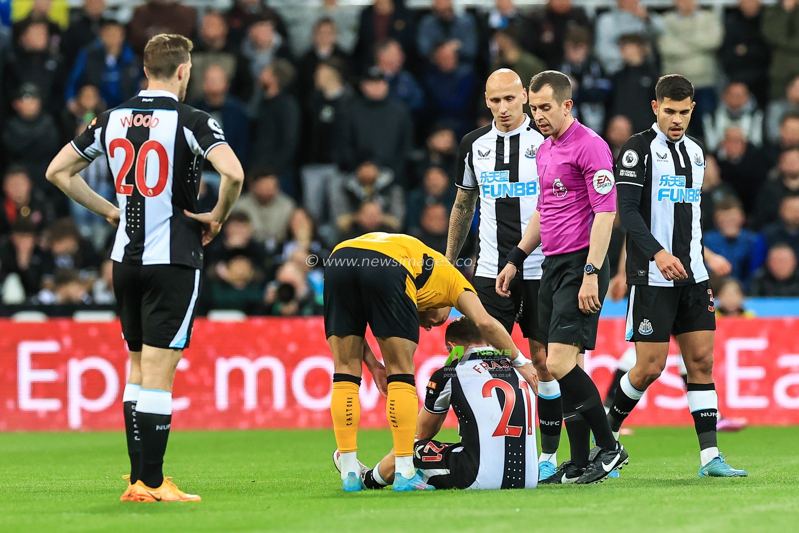 Ryan Fraser #21 of Newcastle United goes down with an injury