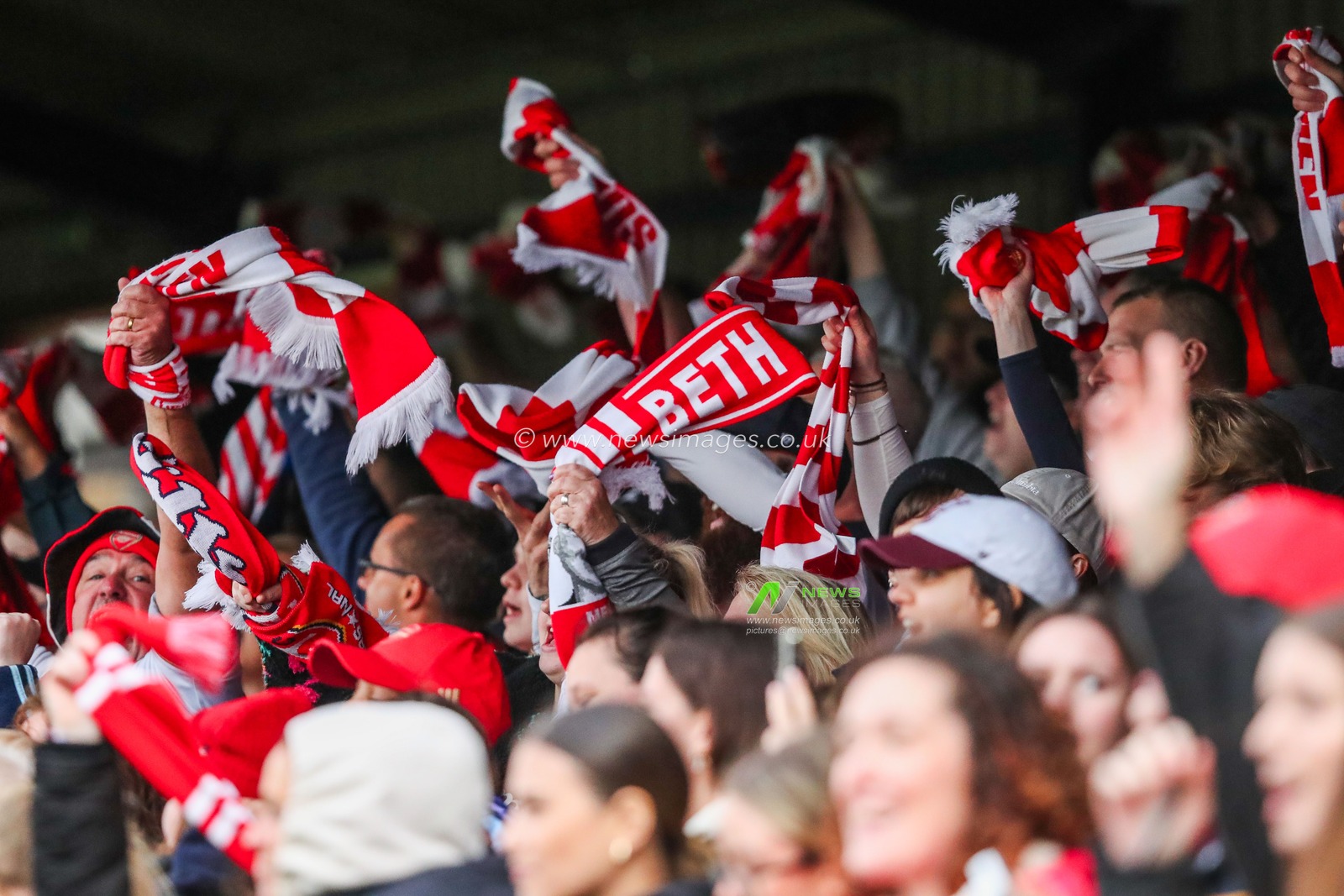 Arsenal fans celebrate the teams victory following the Barclays Women's Super League match West Ham United Women vs Arsenal Women at Chigwell Construction Stadium, Dagenham, United Kingdom, 20th October 2024

(Photo by Izzy Poles/News Images)