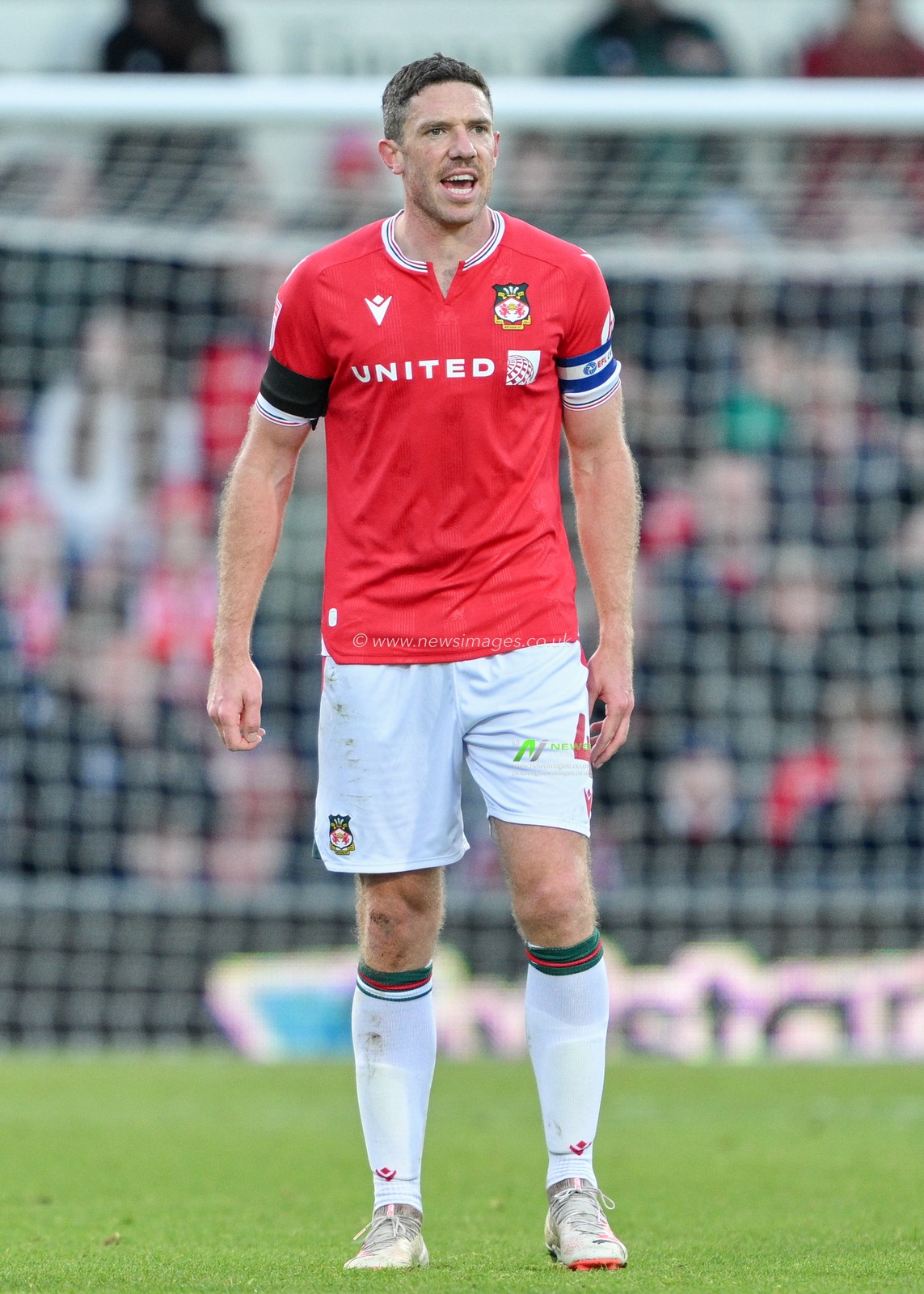 Ben Tozer 4# of Wrexham Association Football Club shouts instructions, during the Sky Bet League 2 match Wrexham vs Gillingham at SToK Cae Ras, Wrexham, United Kingdom, 11th November 2023

(Photo by Cody Froggatt/News Images)