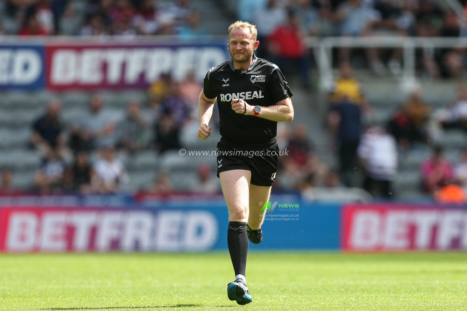 Referee Robert Hicks during the game