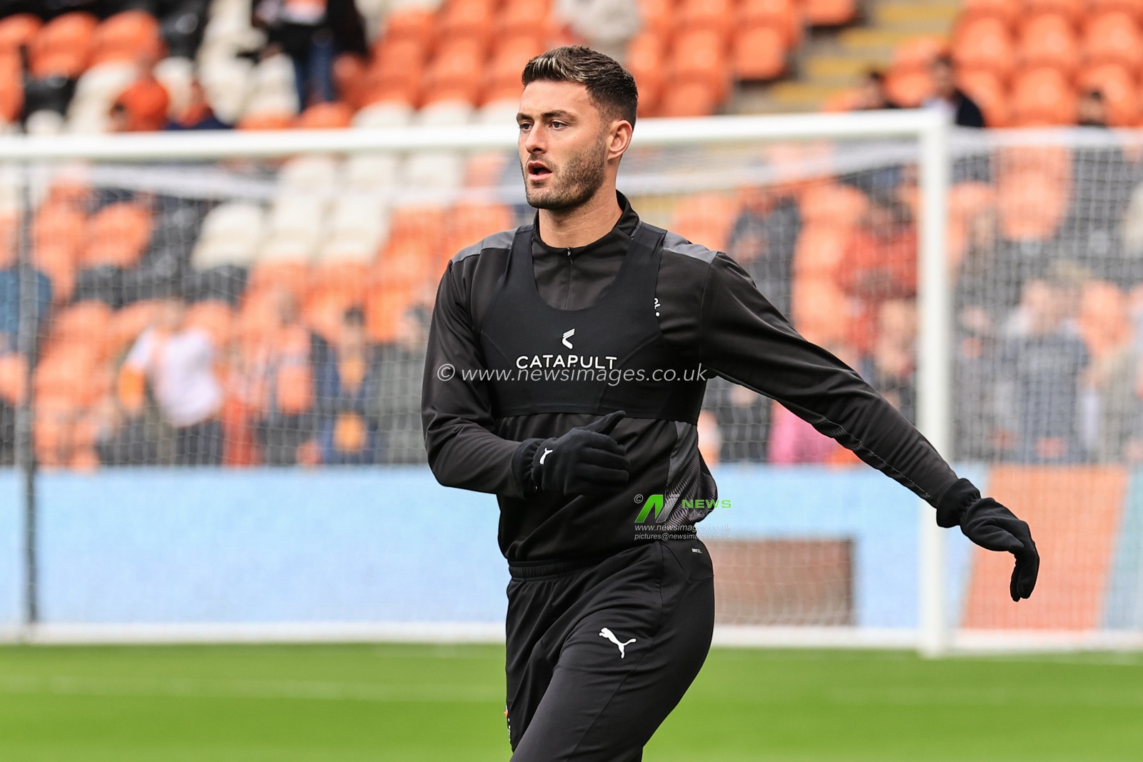 Gary Madine #14 of Blackpool during the pre-game warmup