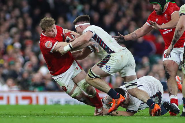 Jac Morgan of Wales is tackled by Tom Curry of England during the 2025 Guinness 6 Nations match Wales vs England at Principality Stadium, Cardiff, United Kingdom, 15th March 2025

(Photo by Andrew Lewis/News Images)