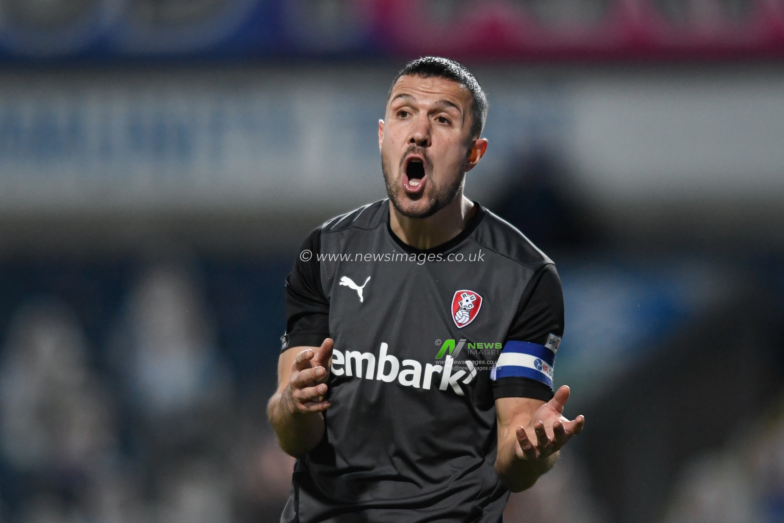 Richard Wood #6 of Rotherham United shouts instructions to his team mates during the game