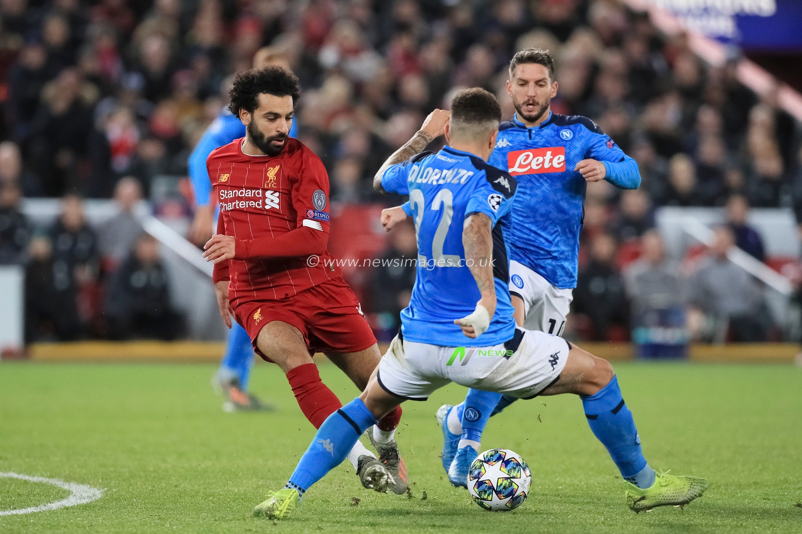 27th November 2019, Anfield, Liverpool, England; UEFA Champions League, Liverpool v Napoli : Mohamed Salah (11) of Liverpool battles with Giovanni Di Lorenzo (22) of Napoli 

Credit: Mark Cosgrove/News Images