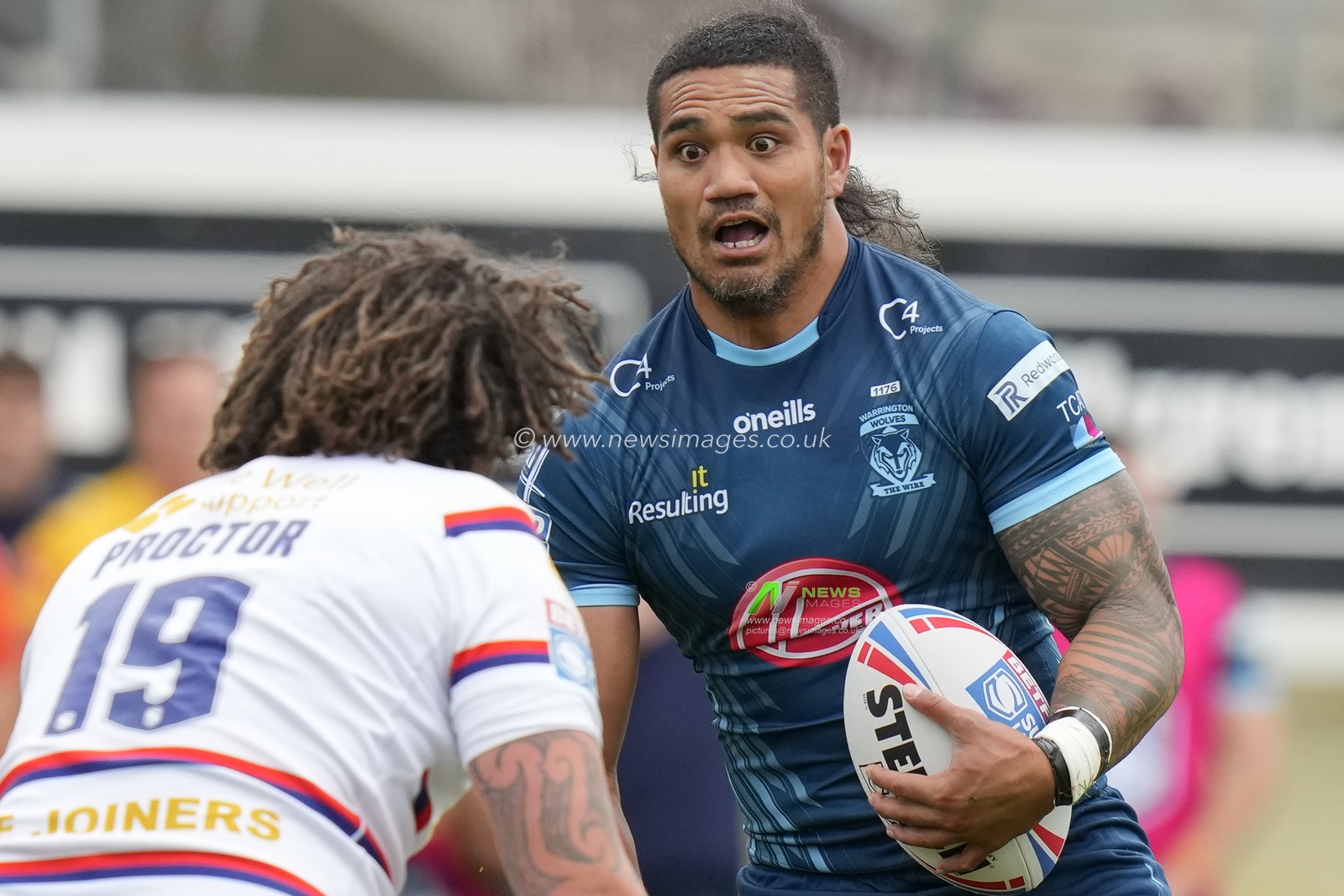 Pete Mataâ€™utia #3 of Warrington Wolves runs at Kevin Proctor #19 of Wakefield Trinity during the Betfred Super League Round 20 match Wakefield Trinity vs Warrington Wolves at The Be Well Support Stadium, Wakefield, United Kingdom, 30th July 2023

(Photo by Steve Flynn/News Images)