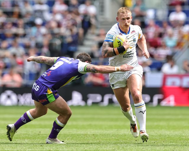 Jarrod O'Connor of Leeds Rhinos breaks with the ball as Andy Ackers of Bradford Bulls reaches for the tackle during the Betfred Super League Magic Weekend match Leeds Rhinos vs Bradford Bulls at Hill Dickinson Stadium, Liverpool, United Kingdom on 05 July 2026

(Photo by Mark Cosgrove/News Images)