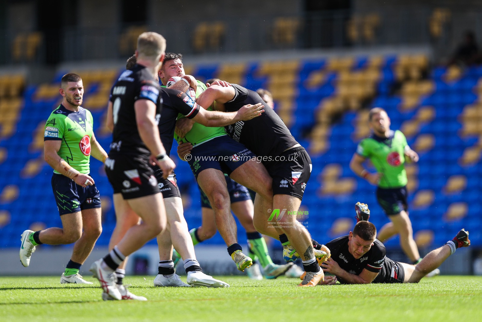 Joe Philbin of Warrington Wolves is tackled during the Betfred Super League Round 21 match London Broncos vs Warrington Wolves at Plough Lane, Wimbledon, United Kingdom, 11th August 2024

(Photo by Izzy Poles/News Images)