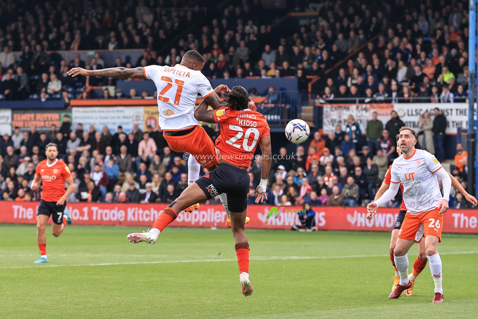 Marvin Ekpiteta #21 of Blackpool heads on goal