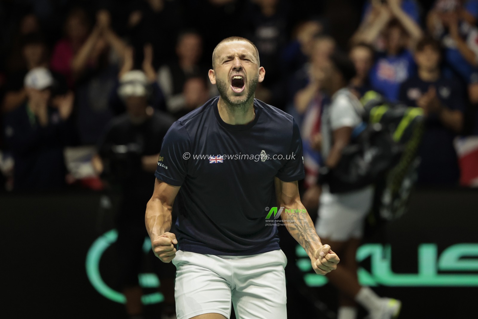 Daniel Evans (GBR) celebrates winning his game against Arthur Fils (FRA) during the Davis Cup match Great Britain vs France at Manchester AO Arena, Manchester, United Kingdom, 17th September 2023

(Photo by Conor Molloy/News Images)