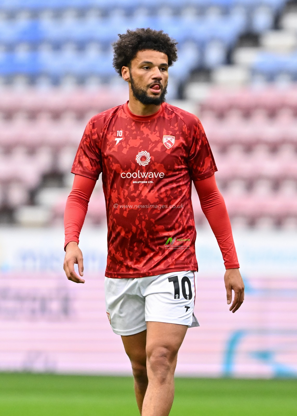 Lee Angol of Morecambe warms up ahead of the Bristol Street Motors Trophy match Wigan Athletic vs Morecambe at DW Stadium, Wigan, United Kingdom, 3rd September 2024

(Photo by Cody Froggatt/News Images)