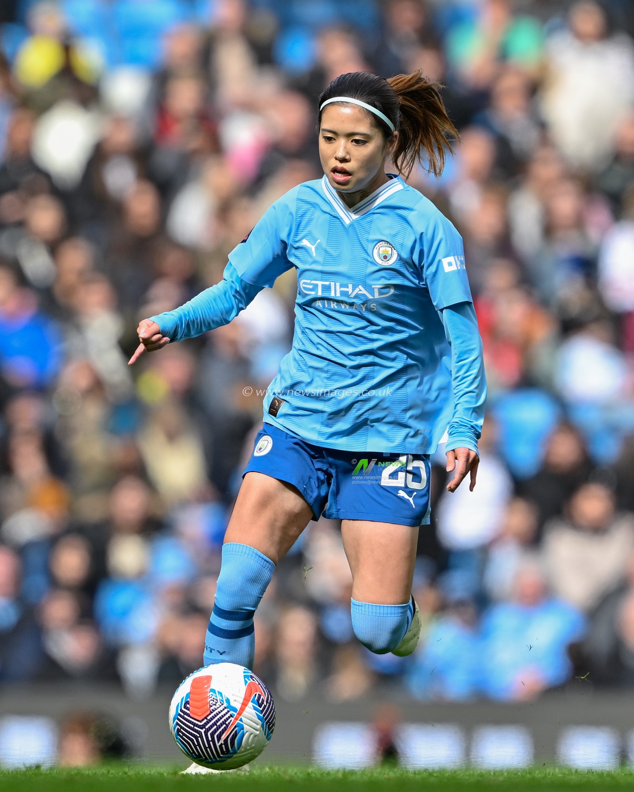 Yui Hasegawa of Manchester City Women in action, during The FA Women's Super League match Manchester City Women vs Manchester United Women at Etihad Stadium, Manchester, United Kingdom, 23rd March 2024

(Photo by Cody Froggatt/News Images)