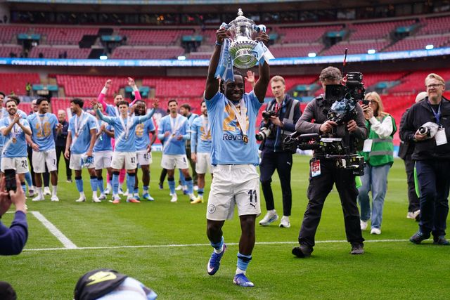Jeremy Doku of Manchester City celebrates the Fa cup trophy with his support during the Emirates FA Cup Final match Chelsea vs Manchester City at Wembley Stadium, London, United Kingdom on 16 May 2026

(Photo by Harvey Murphy/News Images)