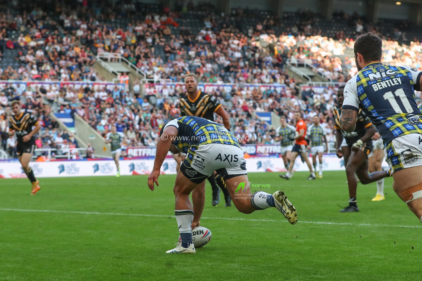 Rhyse Martin #12 of Leeds Rhinos goes over for a try and makes the score 16-10 during the Betfred Super League Magic Weekend match Leeds Rhinos vs Castleford Tigers at St. James's Park, Newcastle, United Kingdom, 3rd June 2023

(Photo by Gareth Evans/News Images)