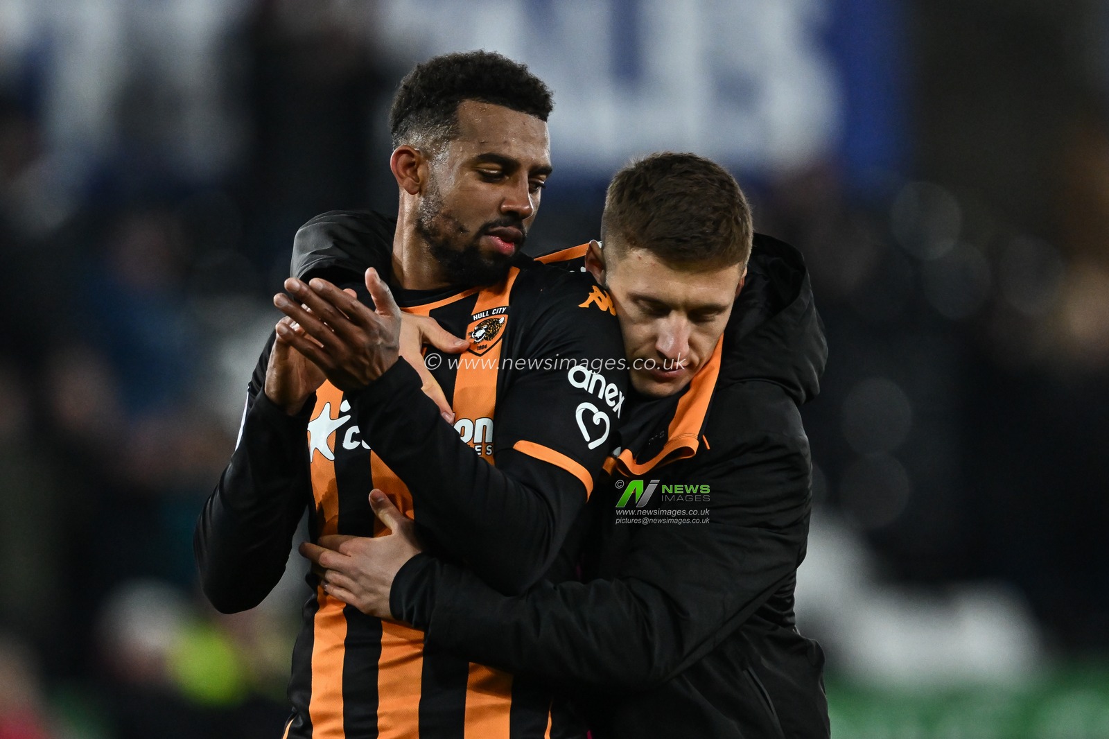 Cyrus Christie #33 of Hull City and Greg Docherty #8 of Hull City embrace after the Sky Bet Championship match Swansea City vs Hull City at Swansea.com Stadium, Swansea, United Kingdom, 25th November 2023

(Photo by Craig Thomas/News Images)