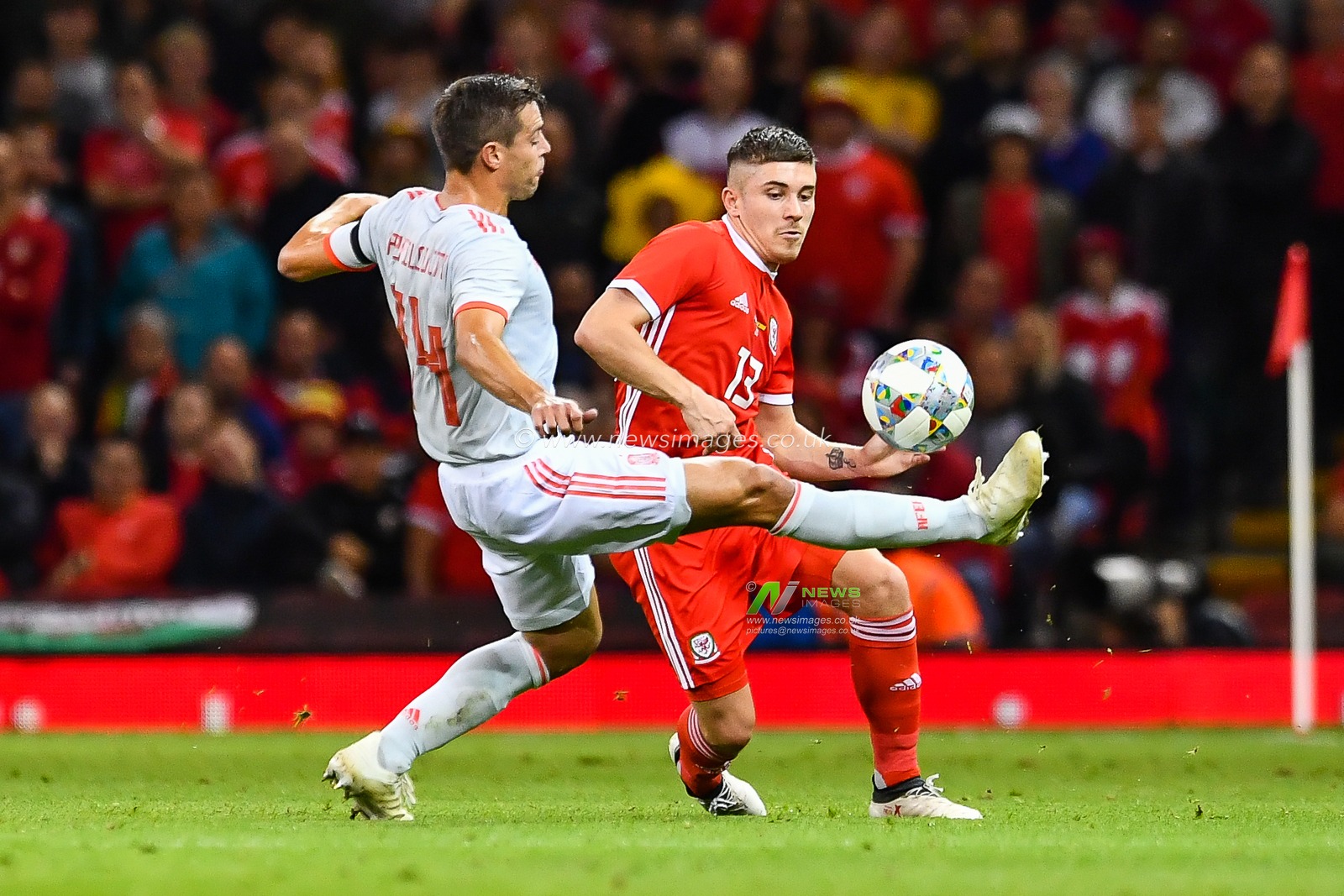 11th October 2018 , Principality Stadium, Cardiff, Wales ; International friendly, Wales v Spain ; Declan John  of Wales and CÃ©sar Azpilicueta of Spain battle for the ball

Credit: Craig Thomas/News Images