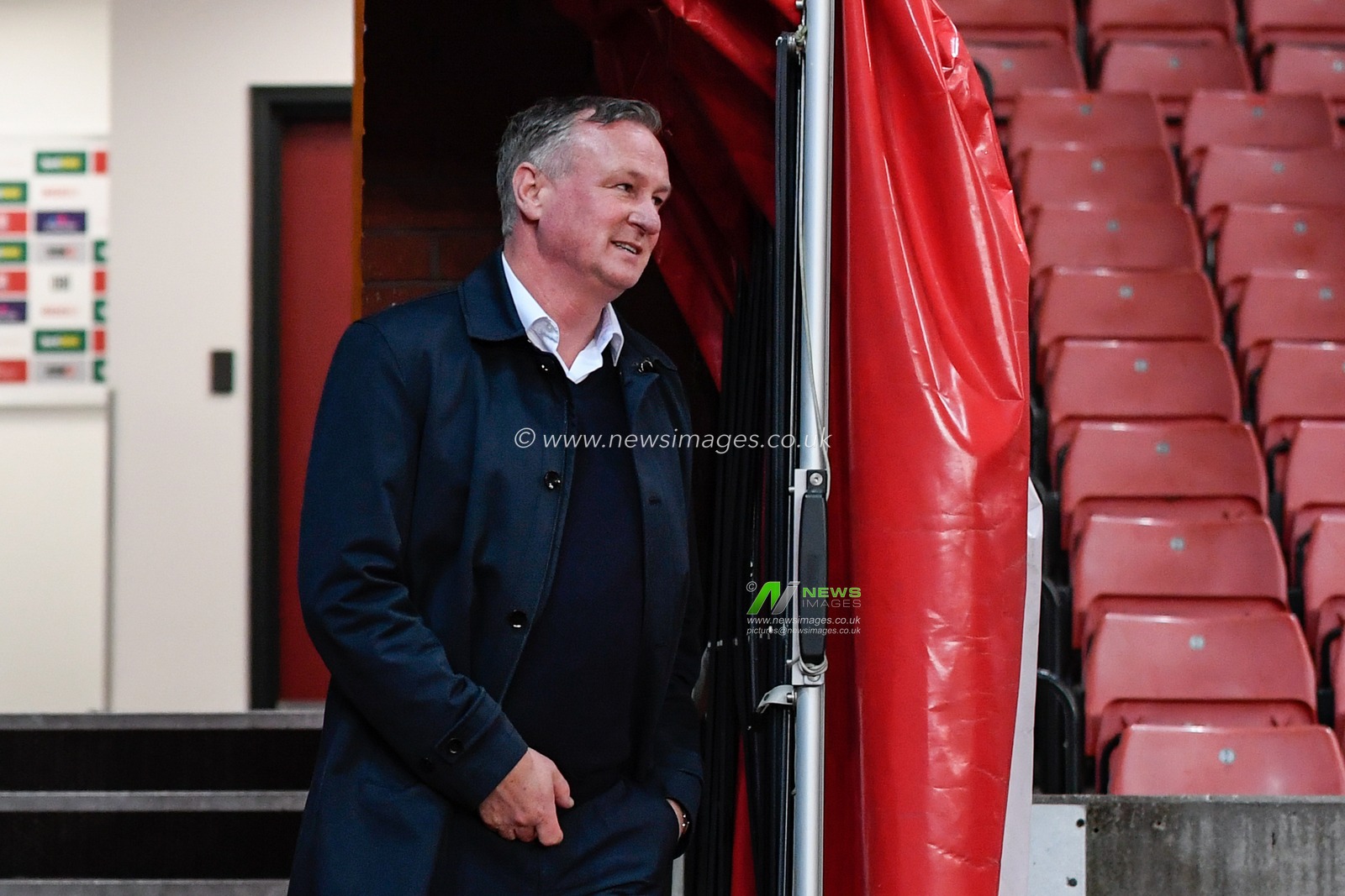 Michael O'Neill manager of Stoke City arrives pitch side