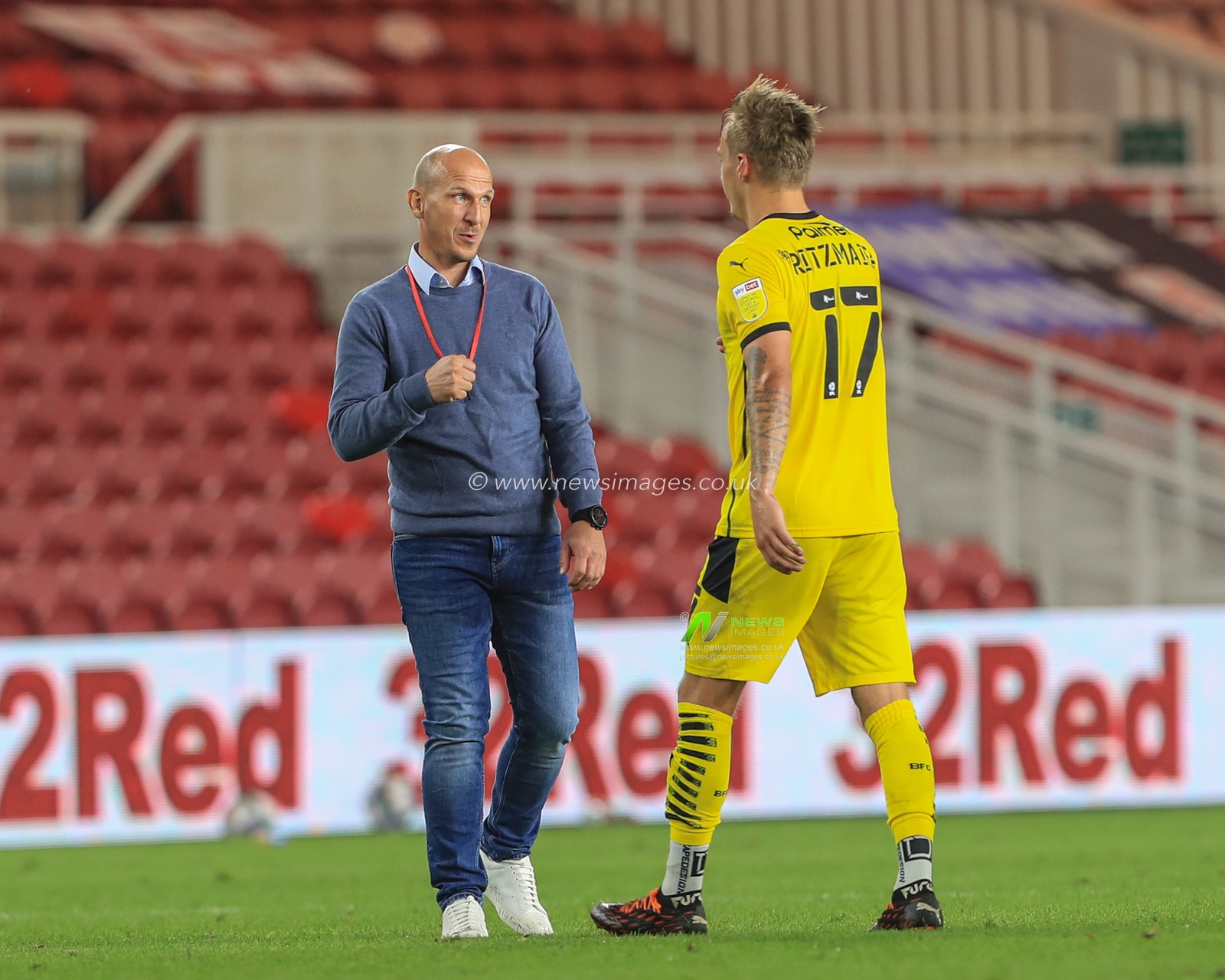 Gerhard Struber manager of Barnsley FC congratulates Marcel Ritzmaier (17) of Barnsley on a great game