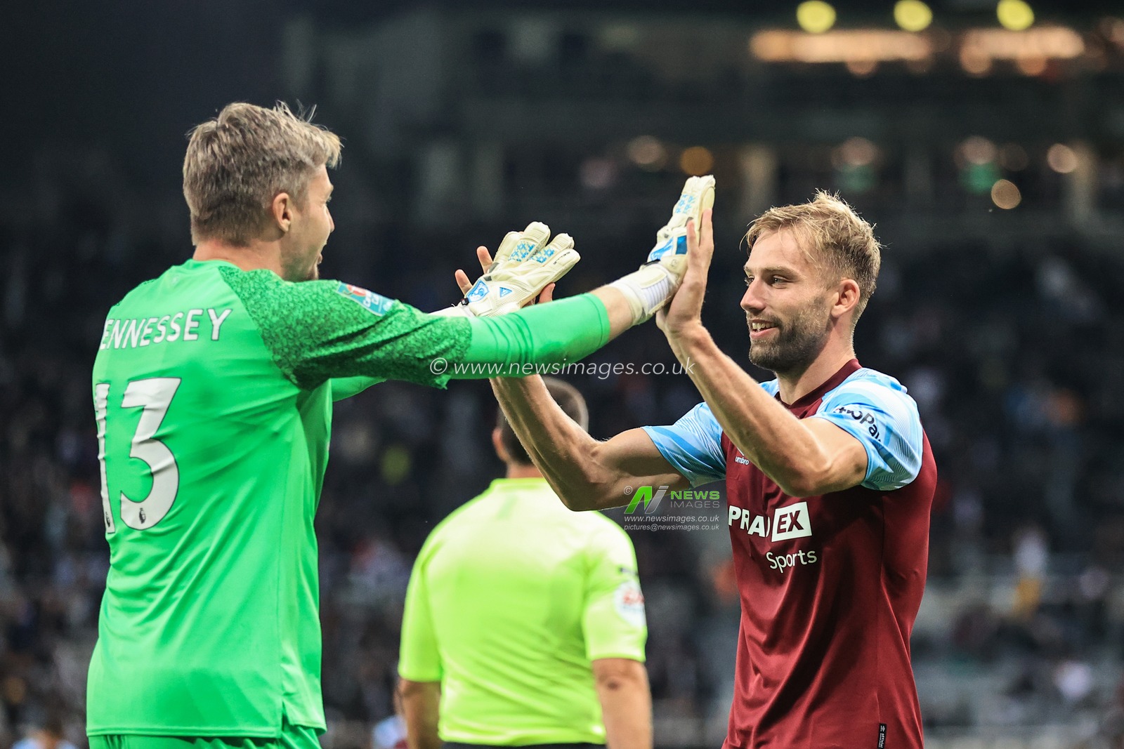 Charlie Taylor #3 of Burnley celebrates scoring the match winning penalty with Wayne Hennessey #13 of Burnley as Burnley beat Newcastle on penalties