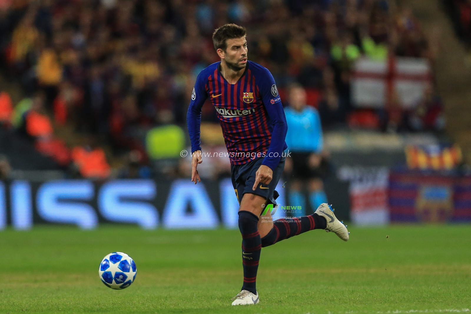 3rd October 2018, Wembley Stadium, London, England; UEFA Champions League, Tottenham v Barcelona ; Gerard Pique (03) of Barcelona with the ball 

Credit: Mark Cosgrove/News Images