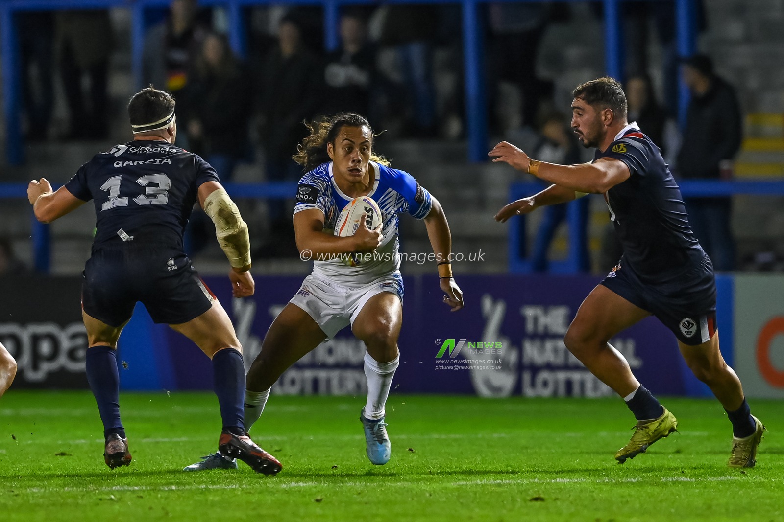 Jarome Luai of Samoa makes a break during the Rugby League World Cup 2021 Group A match Samoa vs France at Halliwell Jones Stadium, Warrington, United Kingdom, 30th October 2022

(Photo by Craig Thomas/News Images)
