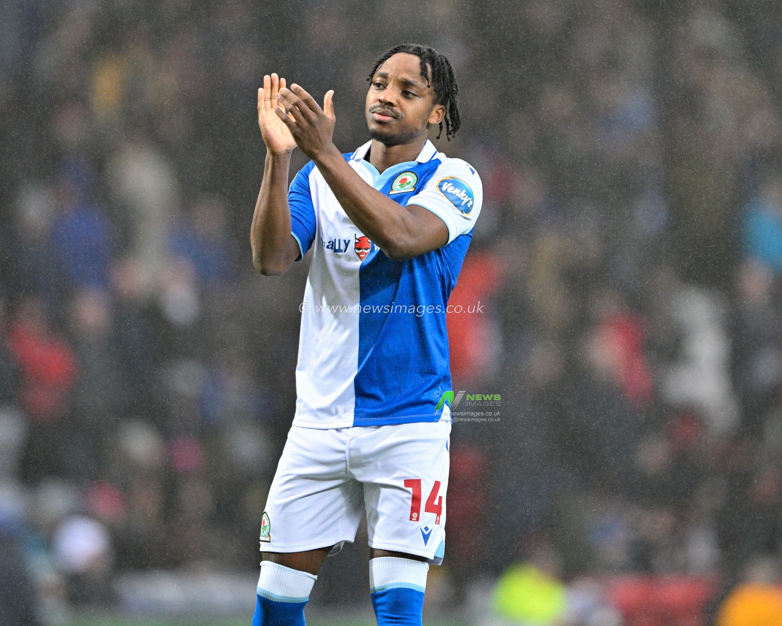 Niall Ennis #14 of Blackburn Rovers claps fans ahead of kick off, during the Sky Bet Championship match Blackburn Rovers vs Watford at Ewood Park, Blackburn, United Kingdom, 23rd December 2023

(Photo by Cody Froggatt/News Images)