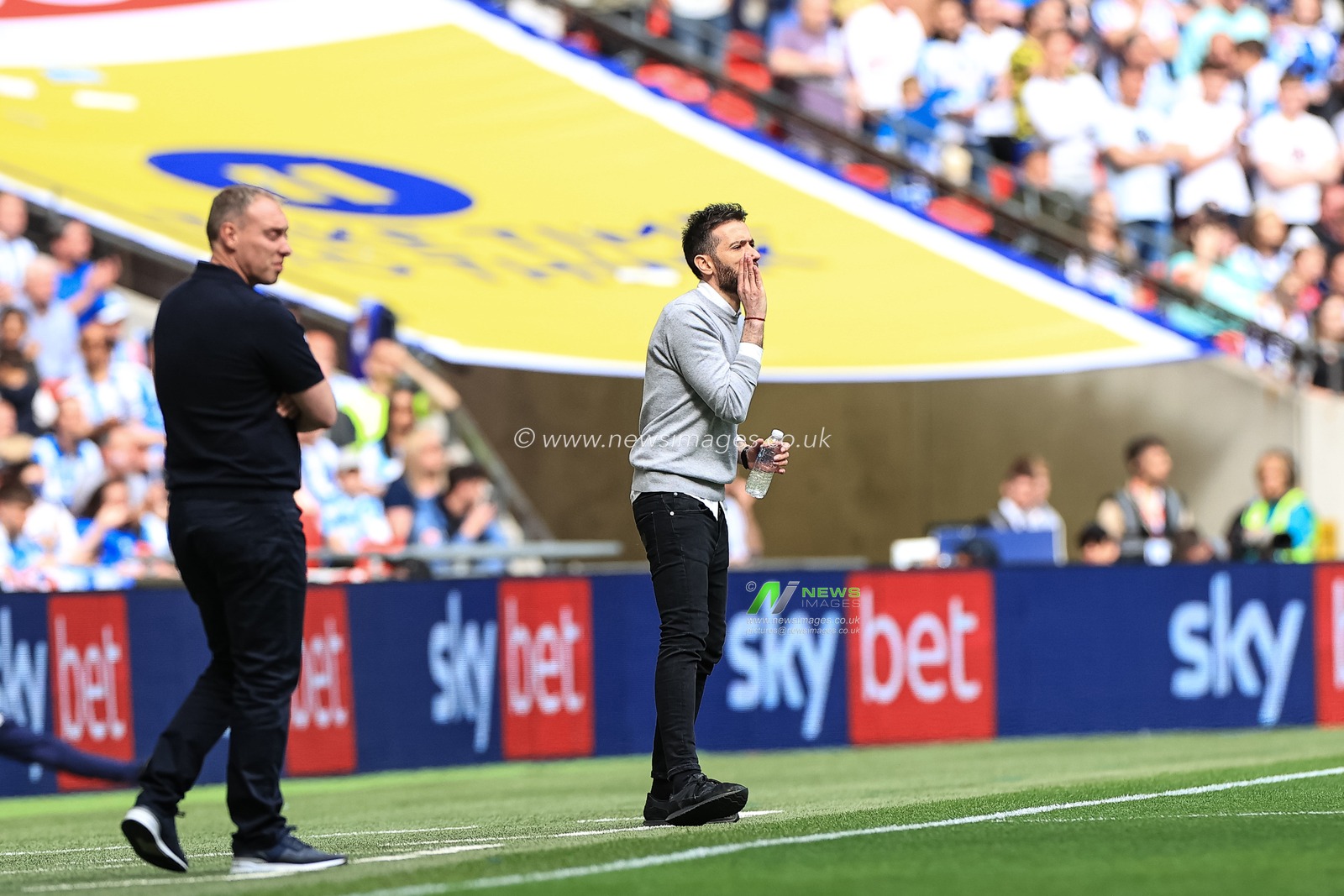 Carlos CorberÃ¡n manager of Huddersfield Town gives his team instructions