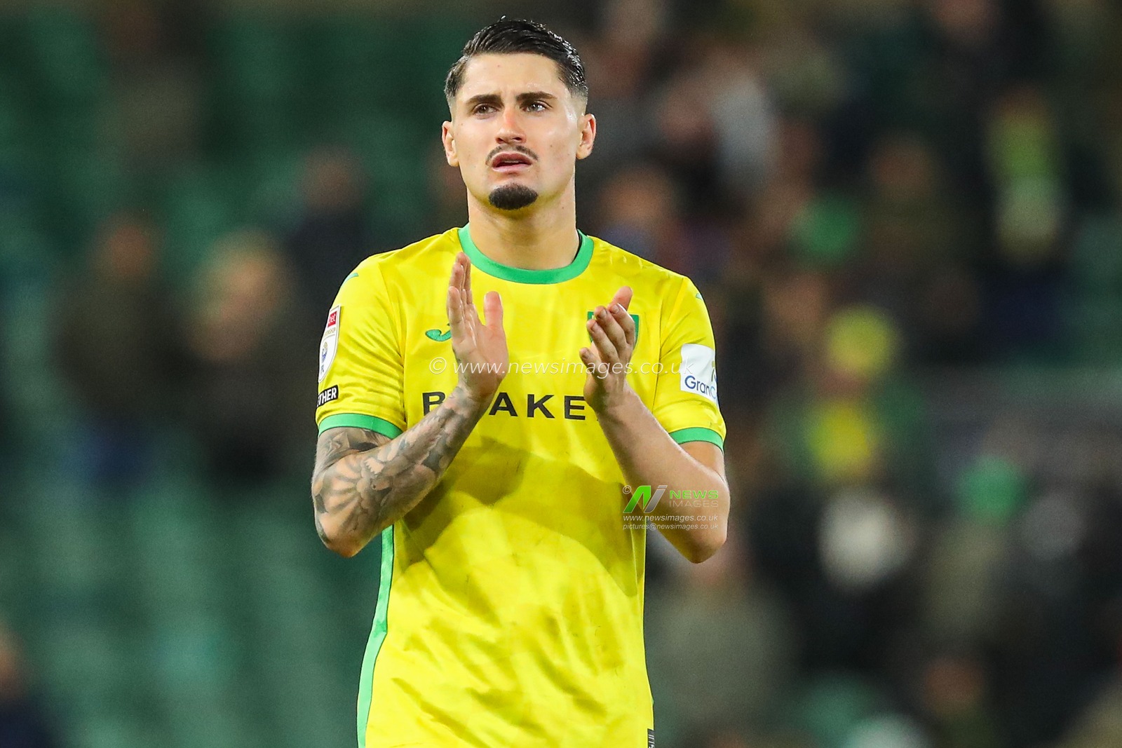Borja Sainz of Norwich City acknowledges the fans after the teams draw following the Sky Bet Championship match Norwich City vs Leeds United at Carrow Road, Norwich, United Kingdom, 1st October 2024

(Photo by Izzy Poles/News Images)