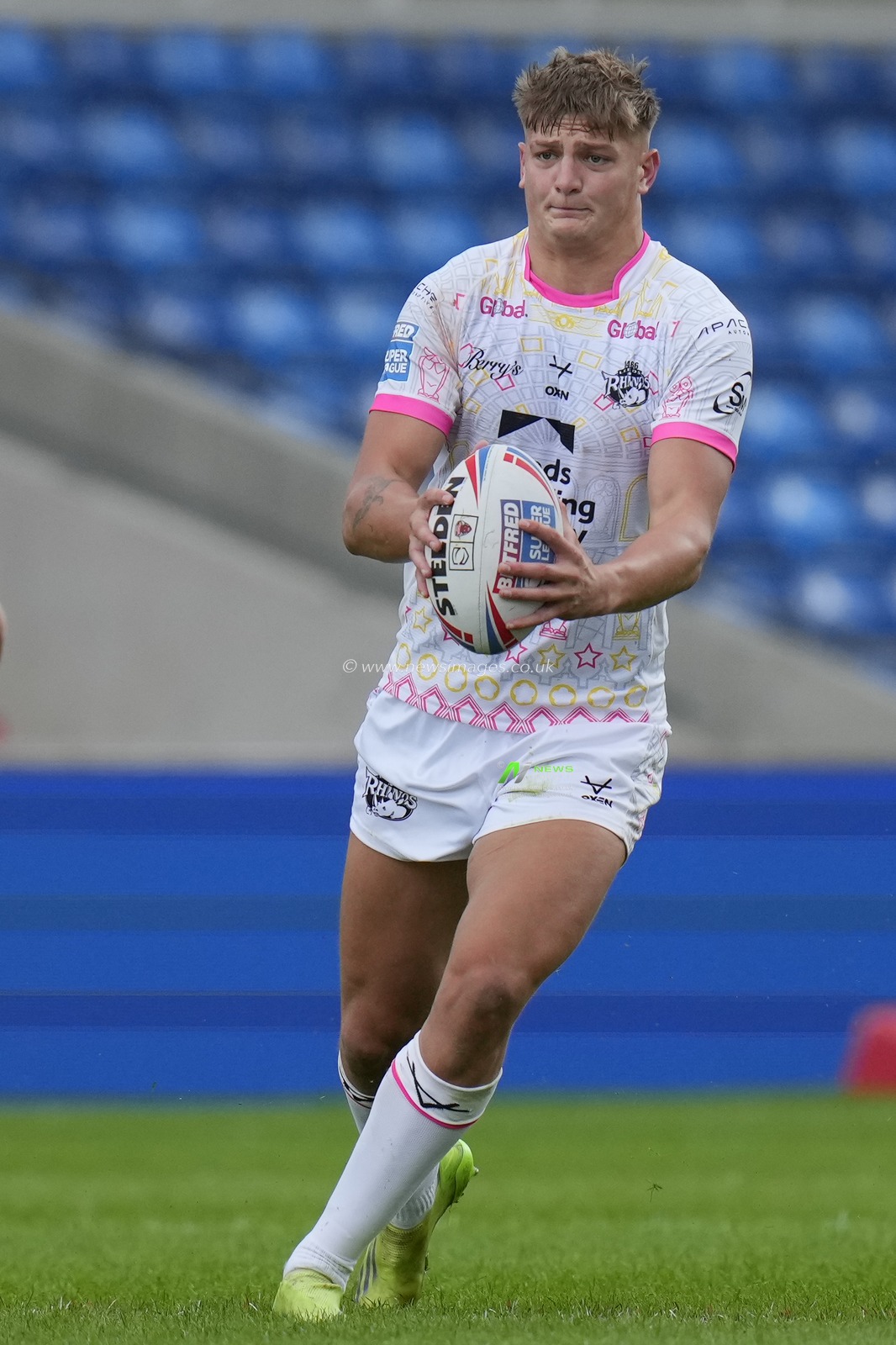Sam Walters #22 of Leeds Rhinos runs with the ball during the Betfred Super League Round 18 match Salford Red Devils vs Leeds Rhinos at AJ Bell Stadium, Eccles, United Kingdom, 9th July 2023

(Photo by Steve Flynn/News Images)