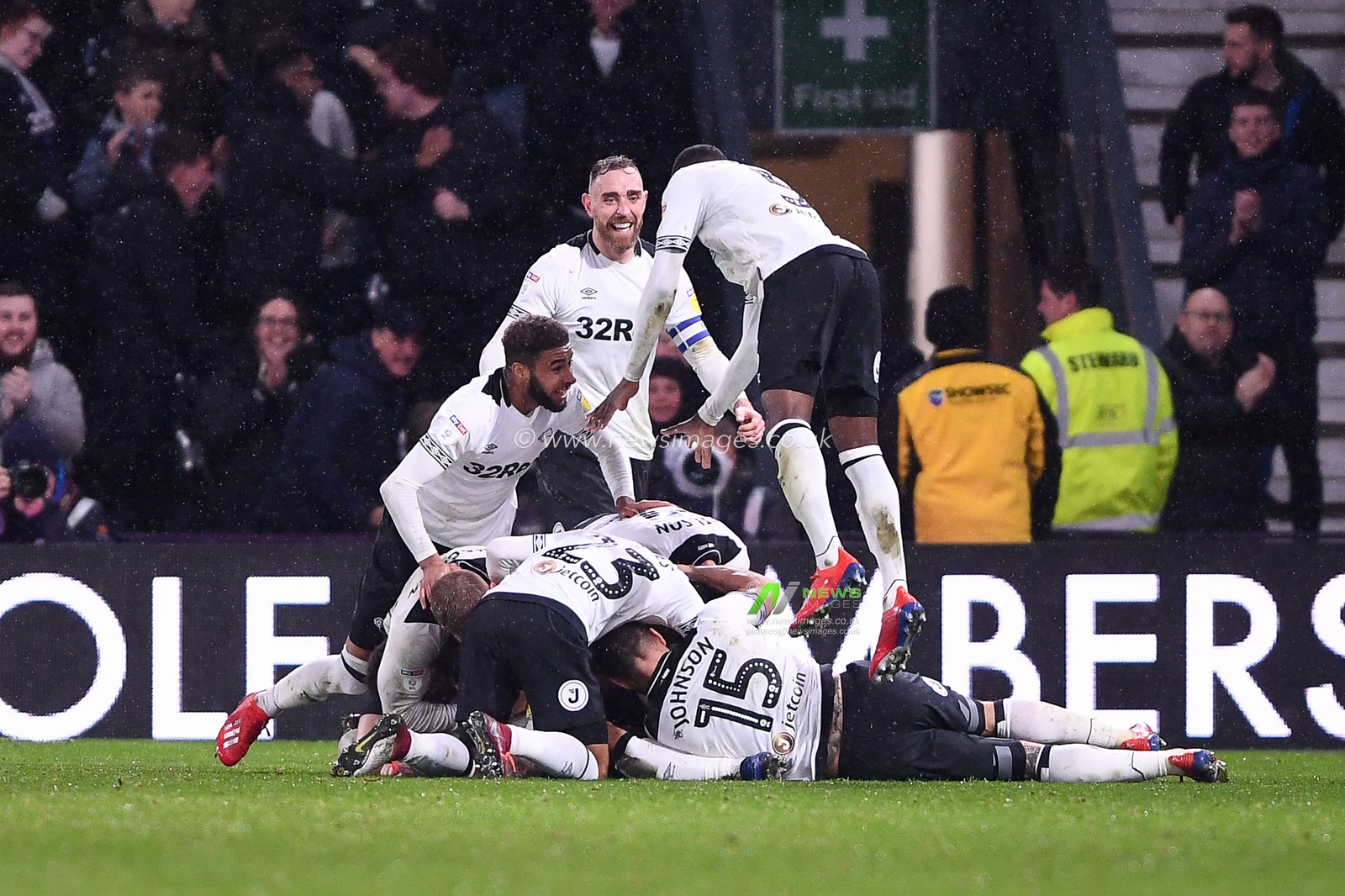 5th March 2019, Pride Park, Derby, England; Sky Bet Championship, Derby County vs Wigan Athletic ; Derby players pile-on Scott Malone (46) of Derby County  after he scored a goal to make it 2-1

Credit: Jon Hobley/News Images 

English Football League images are subject to DataCo Licence