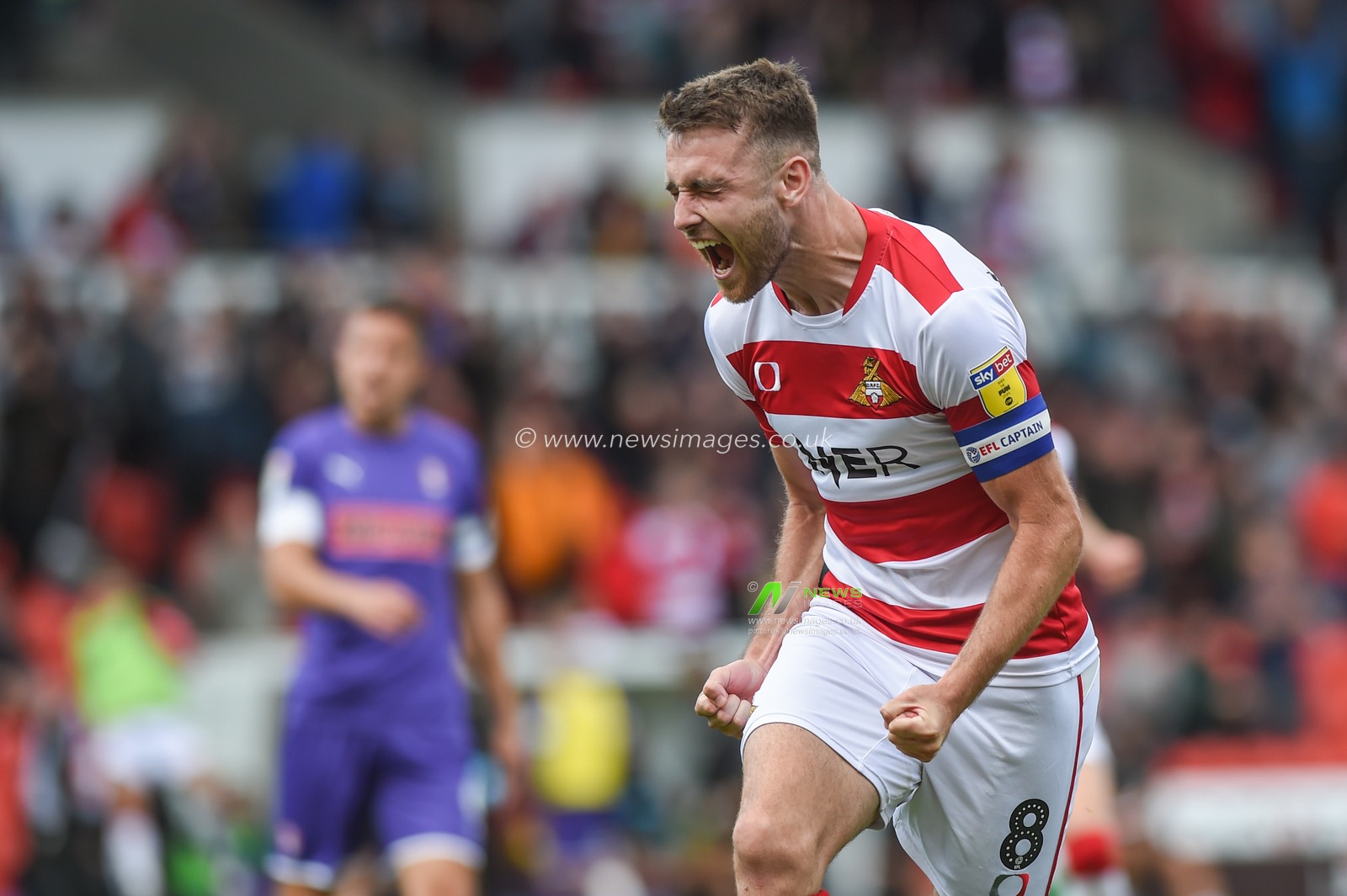 7th September 2019, Keepmoat Stadium, Doncaster, England; Sky Bet League One Football, Doncaster Rovers vs Rotherham United ; Ben Whiteman (8) of Doncaster Rovers celebrates scoring the winning penalty to give Rovers a 2-1 Win over local neighbours Rotherham United.

Credit: Dean Williams/News Images

English Football League images are subject to DataCo Licence
