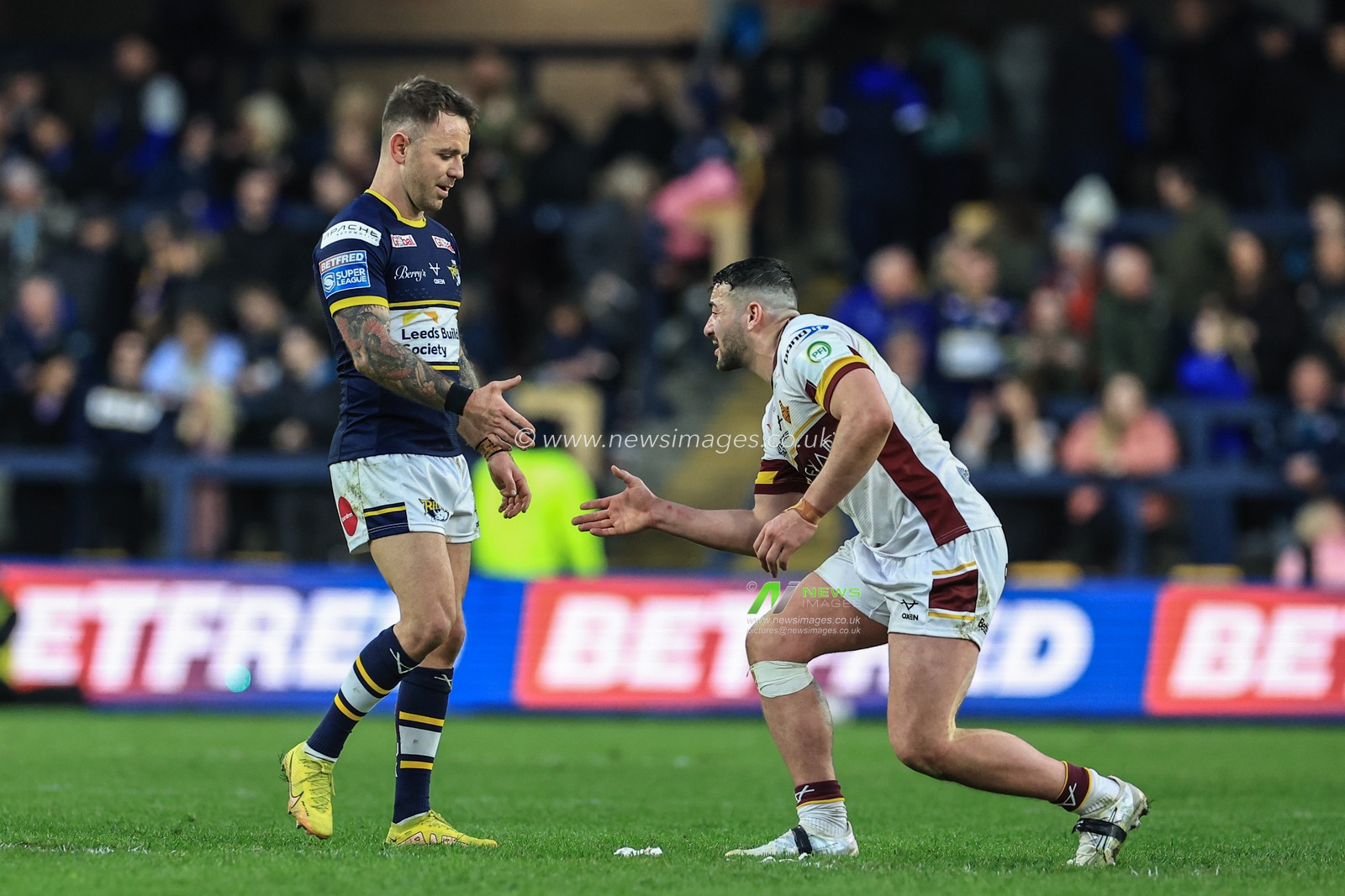 Richie Myler #1 of Leeds Rhinos shakes hands with Jake Connor #1 of Huddersfield Giants during the Betfred Super League Round 8 match Leeds Rhinos vs Huddersfield Giants at Headingley Stadium, Leeds, United Kingdom, 9th April 2023

(Photo by Mark Cosgrove/News Images)