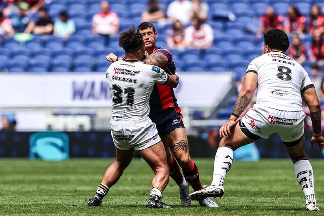 Jay Pitts of Wakefield Trinity is tackled by Ashton Golding of Castleford Tigers during the Betfred Super League Magic Weekend match Wakefield Trinity vs Castleford Tigers at Hill Dickinson Stadium, Liverpool, United Kingdom on 05 July 2026

(Photo by Alfie Cosgrove/News Images)