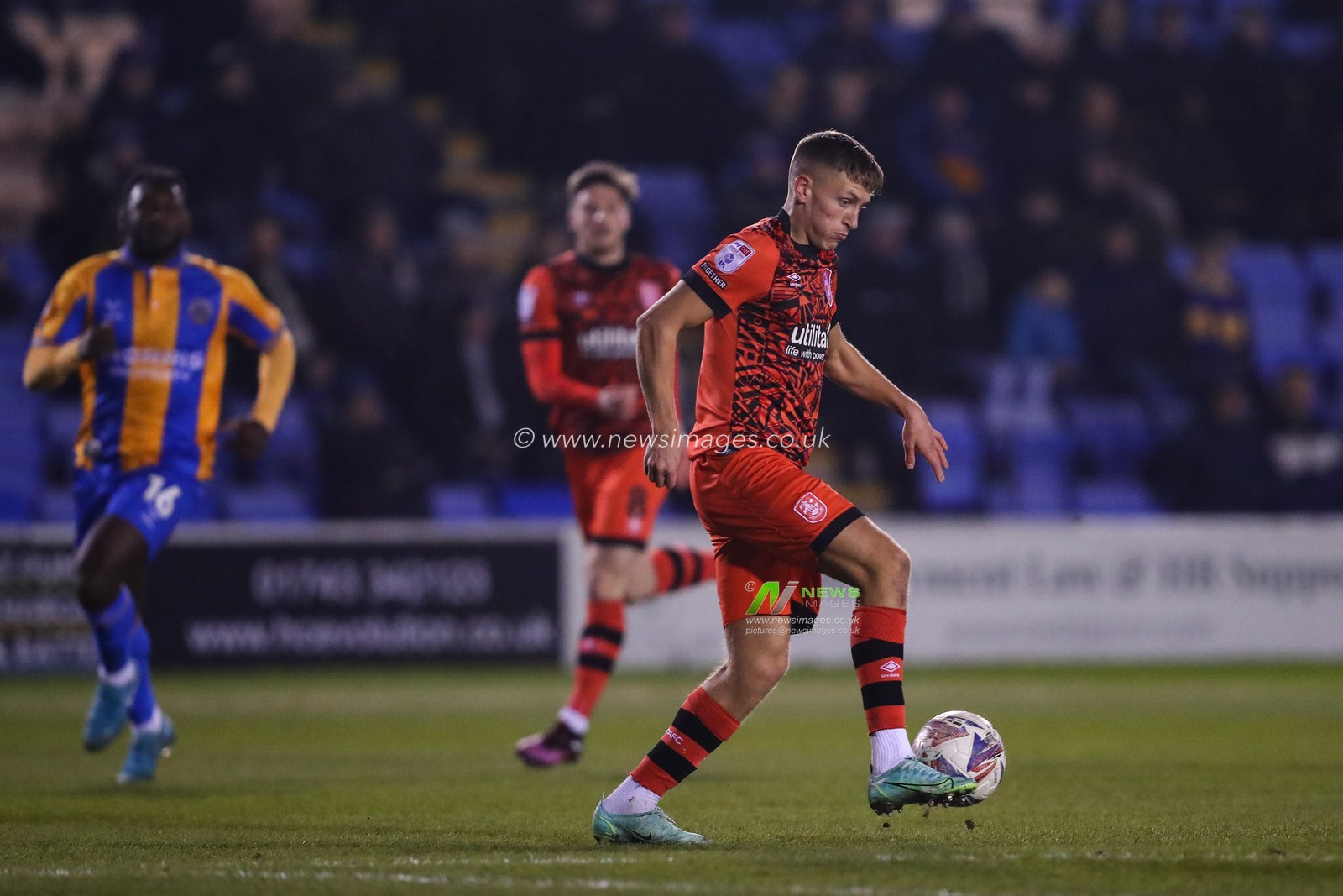 Callum Marshall of Huddersfield Town controls the ball during the Sky Bet League 1 match Shrewsbury Town vs Huddersfield Town at Croud Meadow, Shrewsbury, United Kingdom, 18th February 2025

(Photo by Gareth Evans/News Images)