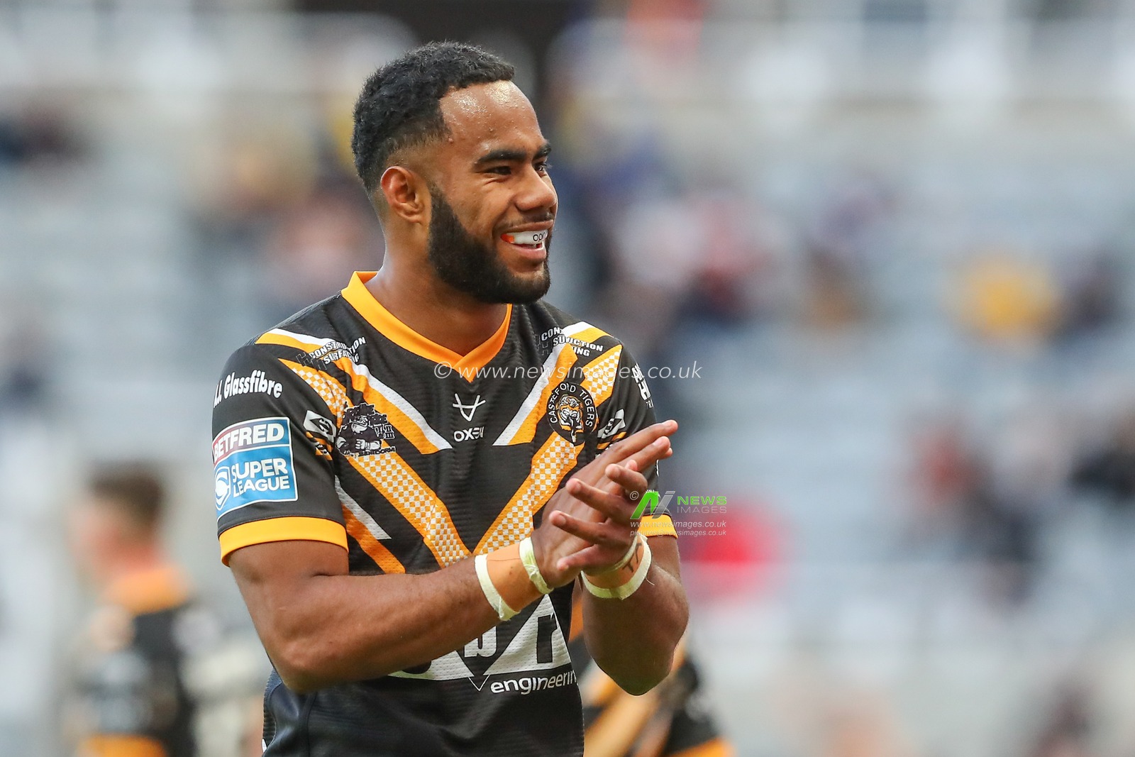 Jason Qareqare #31 of Castleford Tigers applauds the fans during the Betfred Super League Magic Weekend match Leeds Rhinos vs Castleford Tigers at St. James's Park, Newcastle, United Kingdom, 3rd June 2023

(Photo by Gareth Evans/News Images)