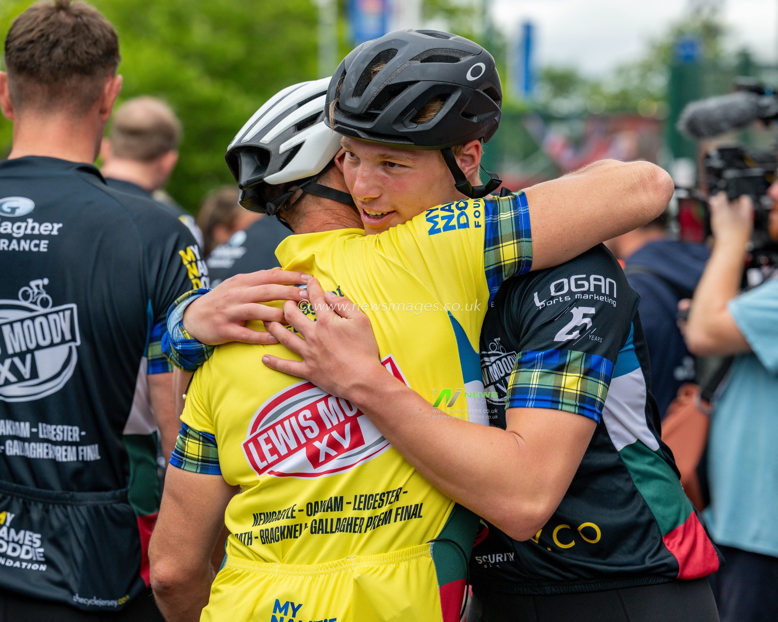 Dylan Moody embraces a member of the support team following Lewis Moody XV Cycle Challenge prior to the Gallagher PREM Final match Northampton Saints vs Exeter Chiefs at Allianz Stadium, Twickenham, United Kingdom on 20 June 2026.

(Photo by Alex Williamson/News Images)