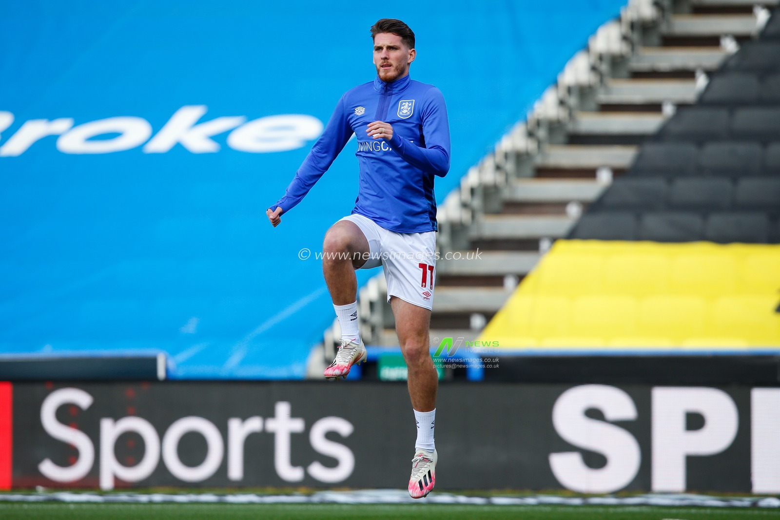 Connor Mahoney #11 of Huddersfield Town warms up before the Sky Bet Championship match Huddersfield Town vs Hull City at John Smith's Stadium, Huddersfield, United Kingdom, 9th October 2022

(Photo by Ben Early/News Images)