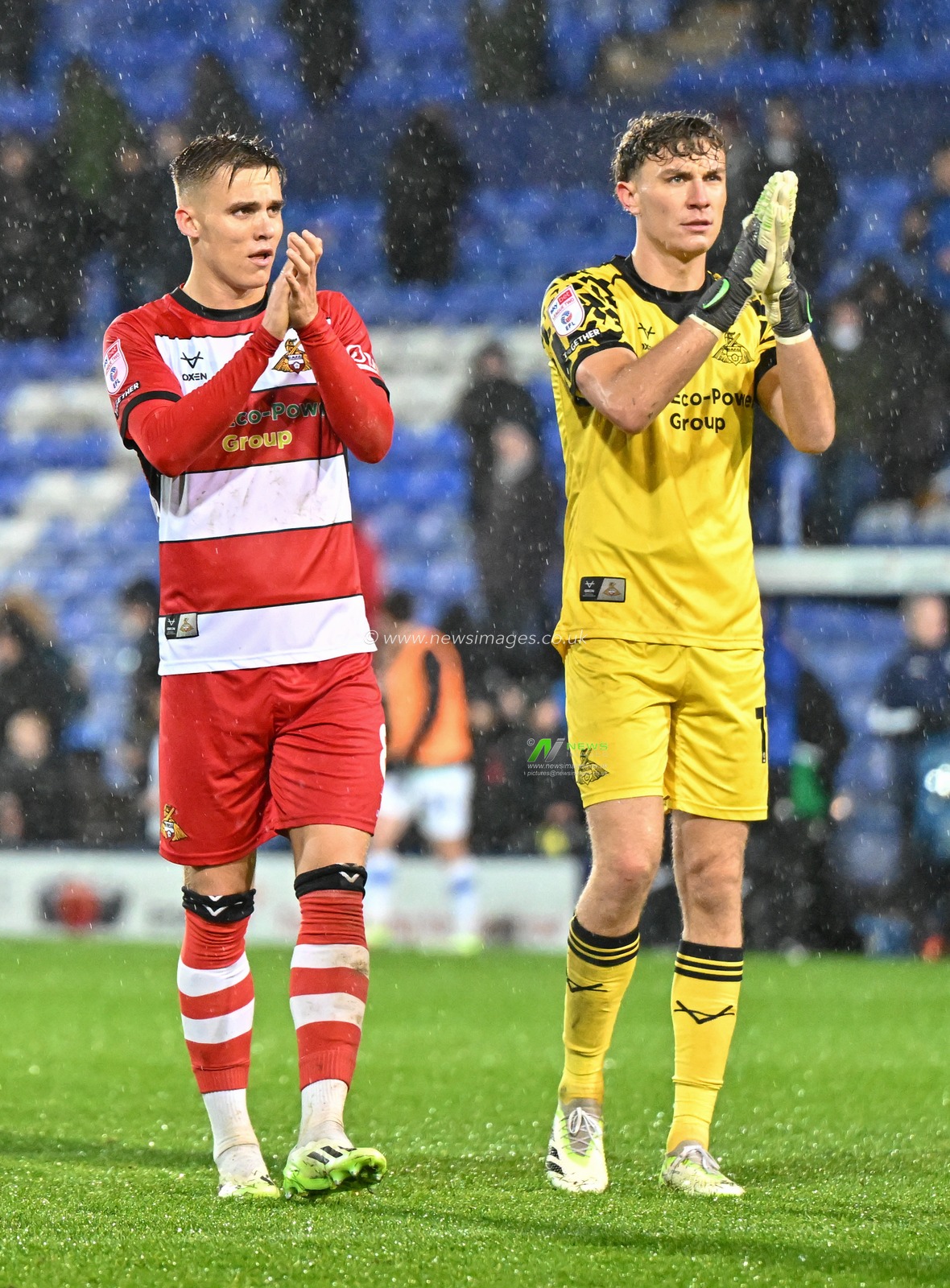George Broadbent 8# of Doncaster Rovers Football Club and Louis Jones 12# of Doncaster Rovers Football Club claps fans at full time, during the Sky Bet League 2 match Tranmere Rovers vs Doncaster Rovers at Prenton Park, Birkenhead, United Kingdom, 20th October 2023

(Photo by Cody Froggatt/News Images)