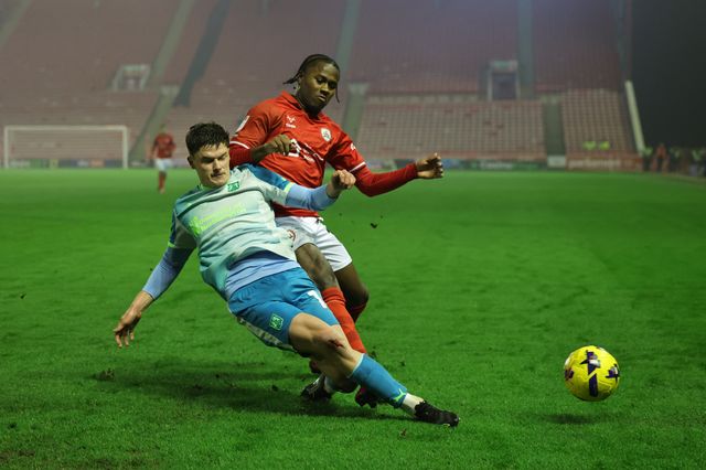 Joe Wormleighton of Northampton Town slide tackles Reyes Cleary of Barnsley during the Sky Bet League 1 match Barnsley vs Northampton Town at Oakwell, Barnsley, United Kingdom, 3rd February 2026

(Photo by Mark Cosgrove/News Images)