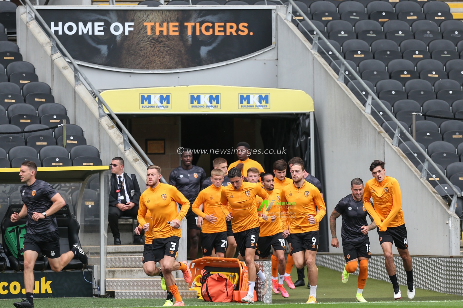 Hull City take to the pitch for the warm up of their first home match of the season