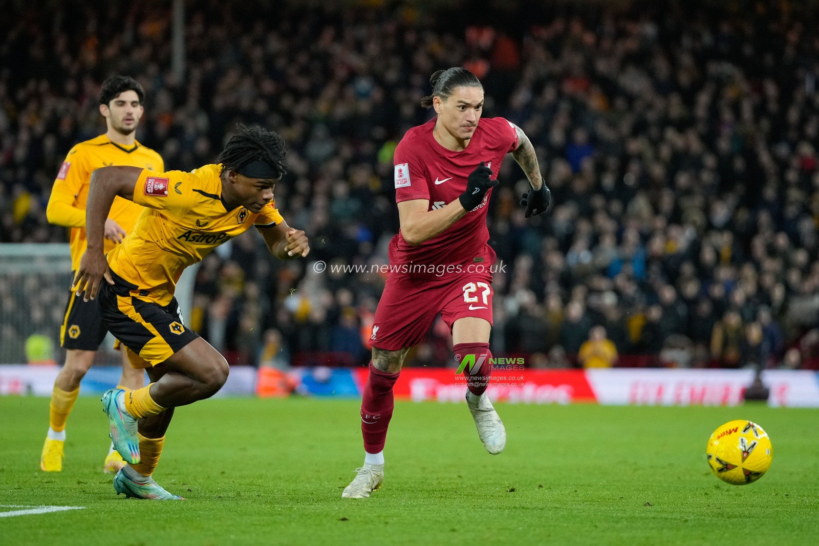 Darwin NÃºÃ±ez #27 of Liverpool breaks past Dexter Lembikisa #81 of Wolverhampton Wanderers during the Emirates FA Cup Third Round match Liverpool vs Wolverhampton Wanderers at Anfield, Liverpool, United Kingdom, 7th January 2023

(Photo by Steve Flynn/News Images)