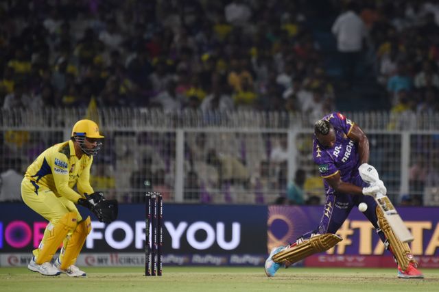 Kolkata Knight Riders' Andre Russell, right, bats and CSK Captain MS Dhoni Wicket keeping during the 2025 IPL match between Kolkata Knight Riders and Chennai Super Kings at Eden Gardens on May 07, 2025, in Kolkata, India. Photo by Debajyoti Chakraborty.(Photo: Debajyoti Chakraborty/News Images)