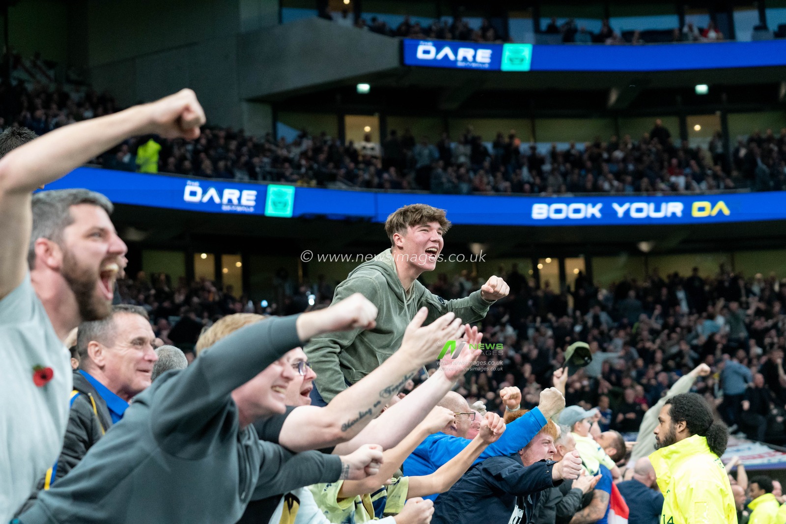 Leeds fans celebrate after Rodrigo Moreno #19 of Leeds United  scores a goal to give them a 3:2 lead during the Premier League match Tottenham Hotspur vs Leeds United at Tottenham Hotspur Stadium, London, United Kingdom, 12th November 2022

(Photo by Richard Washbrooke/News Images)