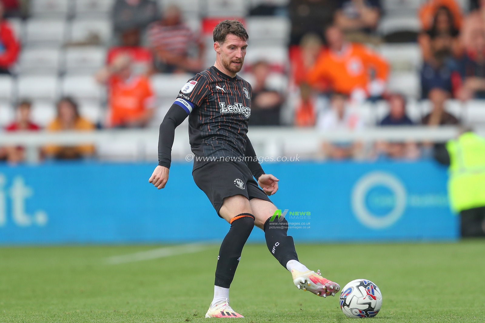 James Husband #3 of Blackpool passes the ball  during the Sky Bet League 1 match Lincoln City vs Blackpool at Gelder Group Sincil Bank Stadium, Lincoln, United Kingdom, 26th August 2023

(Photo by Gareth Evans/News Images)