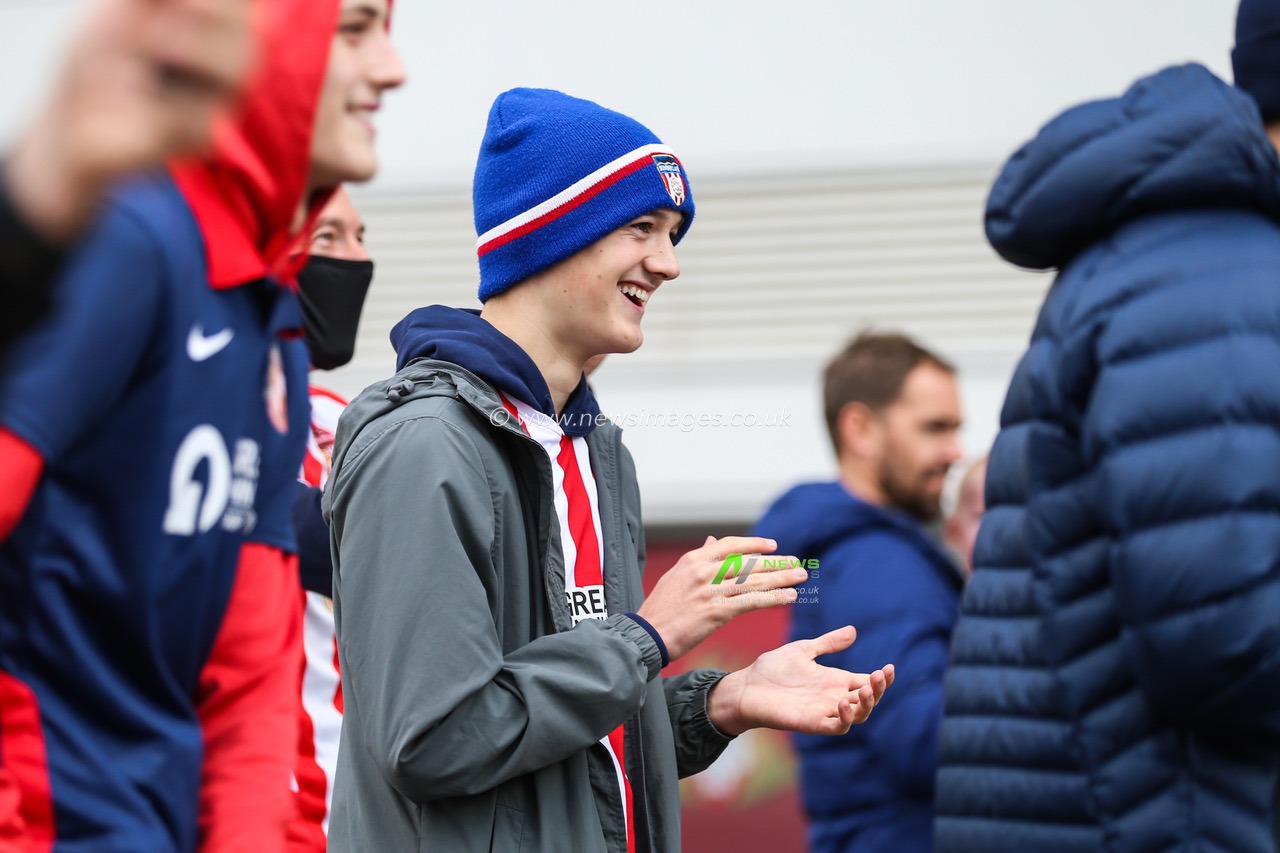 Sunderland fans wait for there team to arrived at the Keepmoat stadium ahead of there game against Doncaster