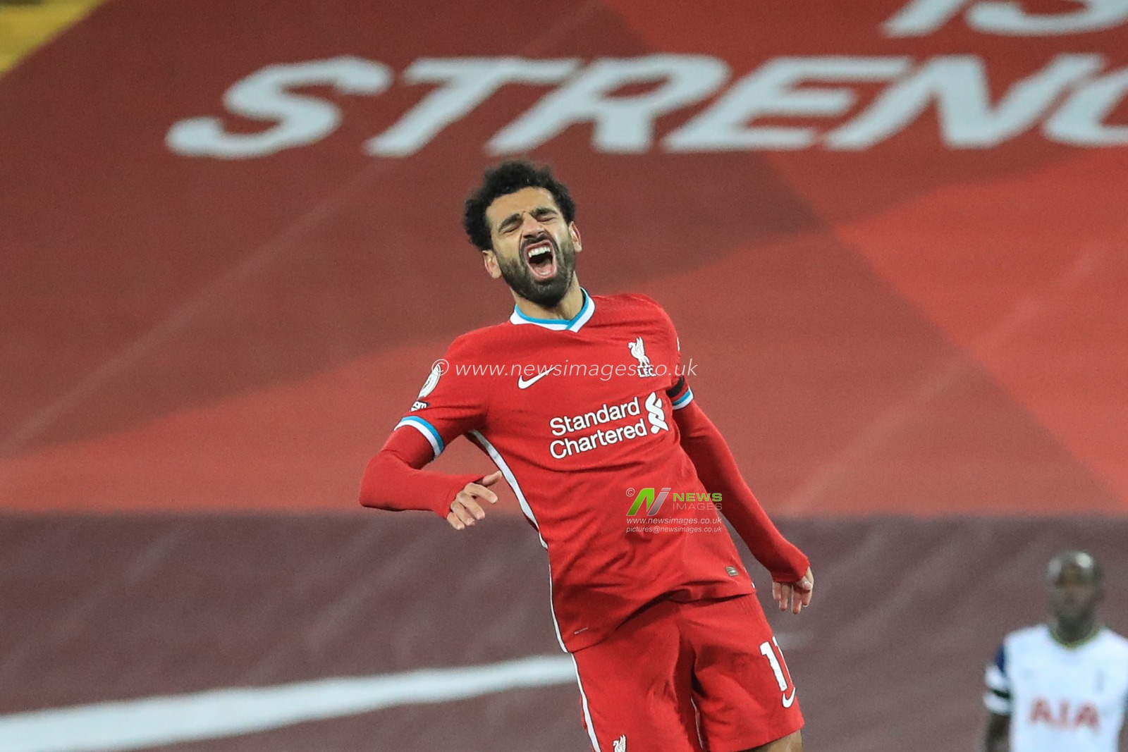 Mohamed Salah #11 of Liverpool reacts as he misses a chance on goal