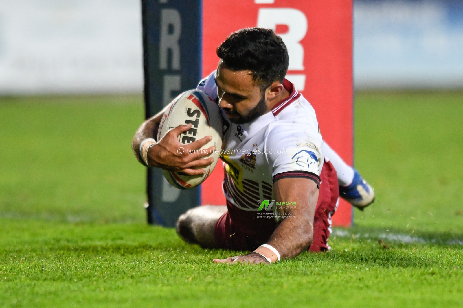 Bevan French (6) of Wigan Warriors goes over for a try